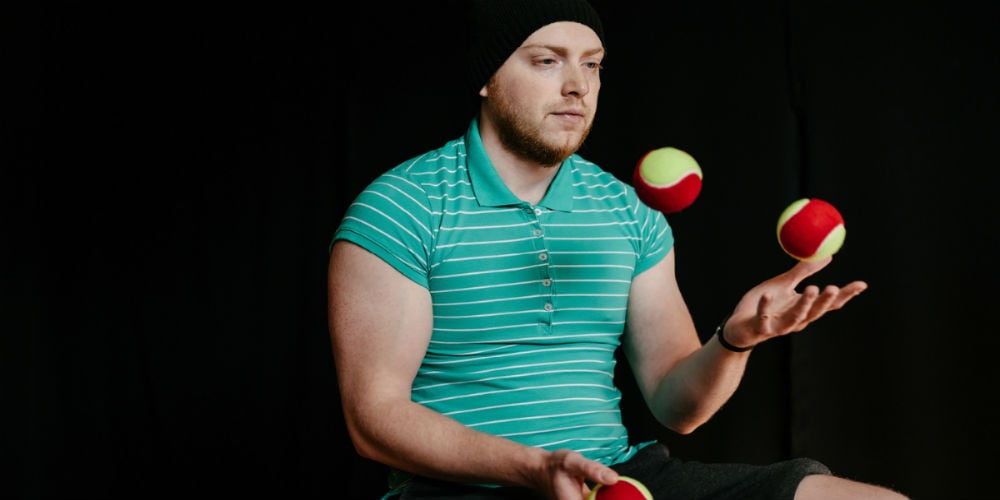 bigstock-Juggling-Young-Man–113981195