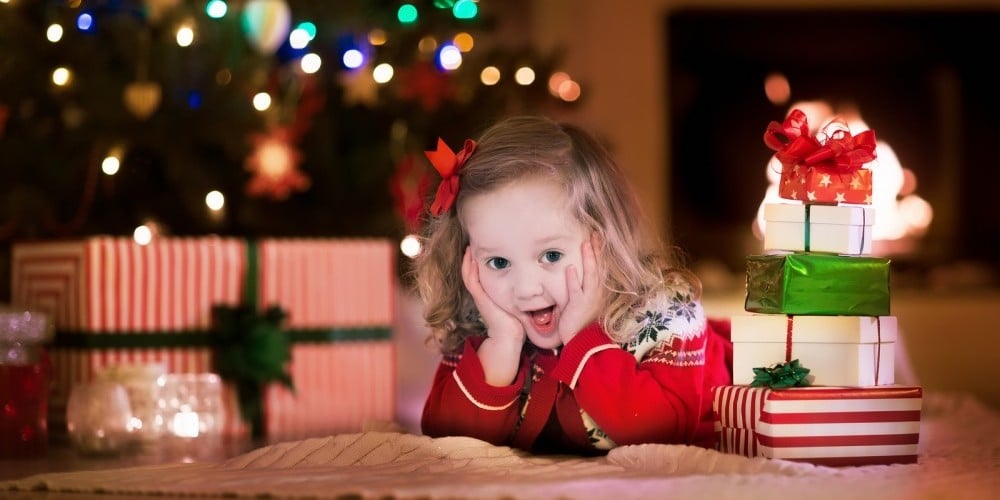 bigstock-Kids-Opening-Christmas-Present-98243435-e1450794990459