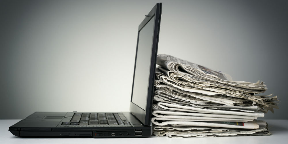 bigstock-Laptop-and-newspaper-concept-f-66698950