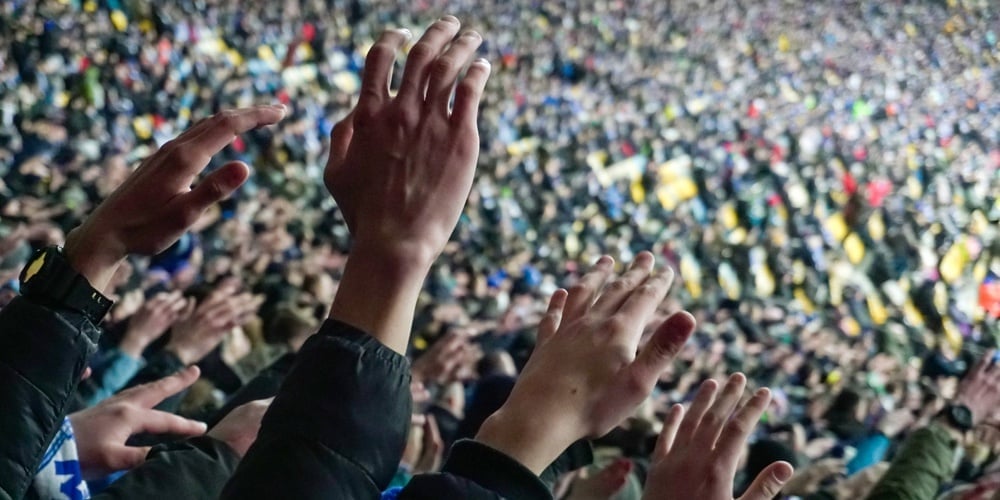 Large Crowd Of Football Fans Clapping Hands