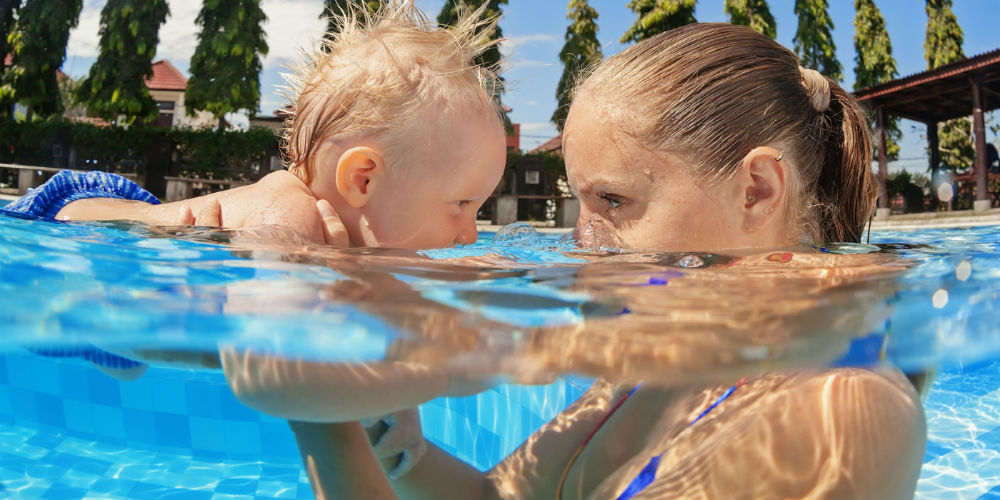 bigstock-Little-Baby-Boy-Swimming-In-Ou-97672715