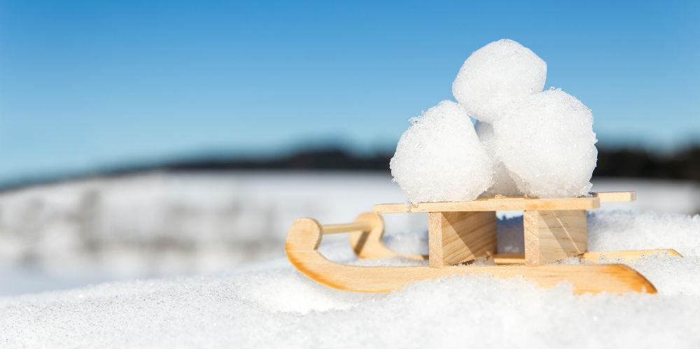 bigstock-Little-Sledge-With-Snowballs-I-103839209