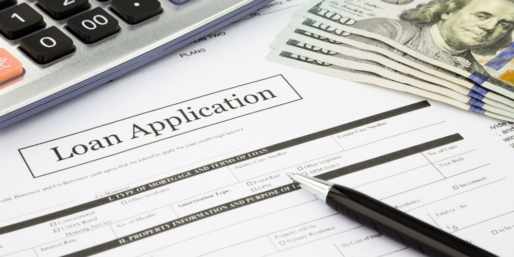 bigstock-Loan-Application-Form-And-Doll-59049944