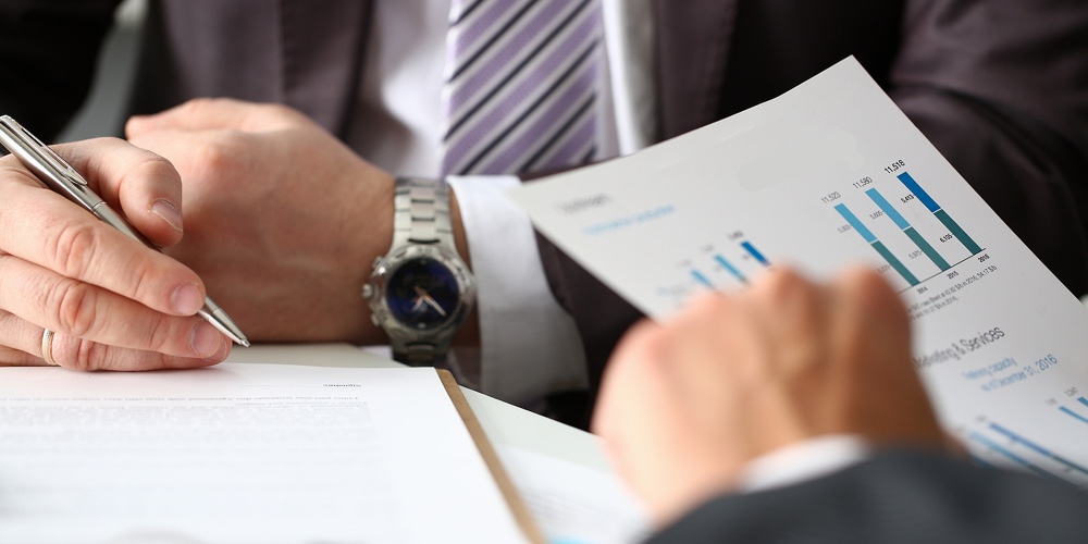 Screenshot 2023-01-24 at 3.26.10 PM|Male Arm In Suit And Tie Fill Form Clipped Pad With Silver Pen Closeup. Sign Gesture Read Pact Sale