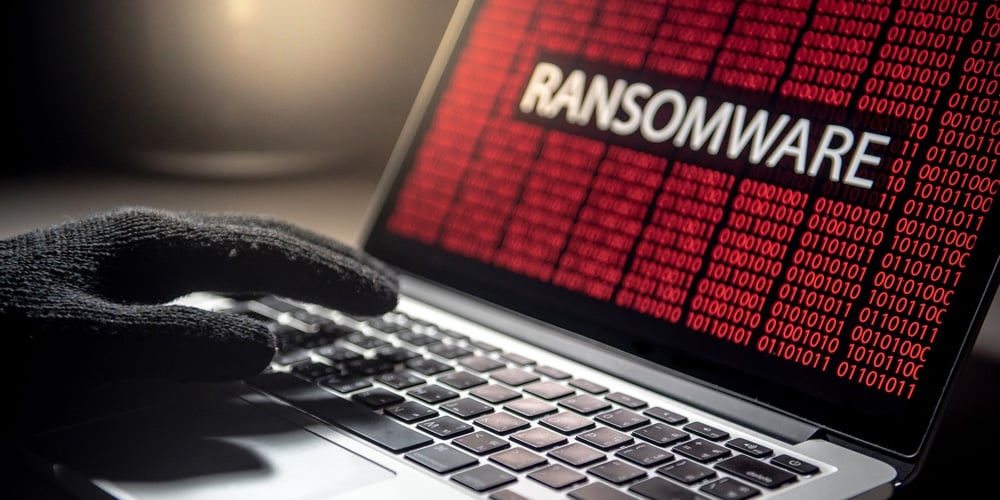 bigstock-Male-Hacker-Hand-On-Laptop-Com-250641127
