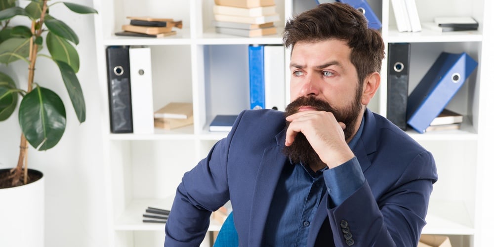 bigstock-Man-Bearded-Businessman-Though-286579144