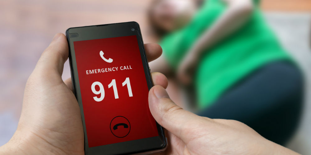 bigstock-Man-Dialing-Emergency—Num-132654941