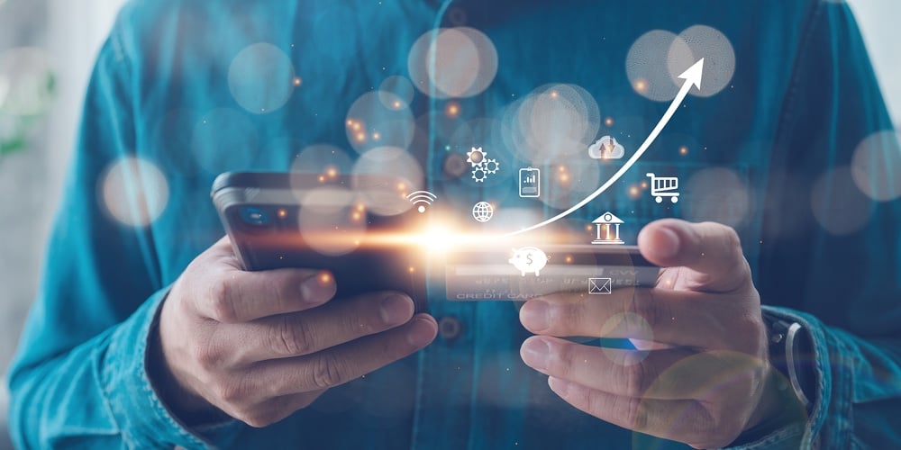 bigstock-Man-Using-Mobile-Online-Bankin-431804915