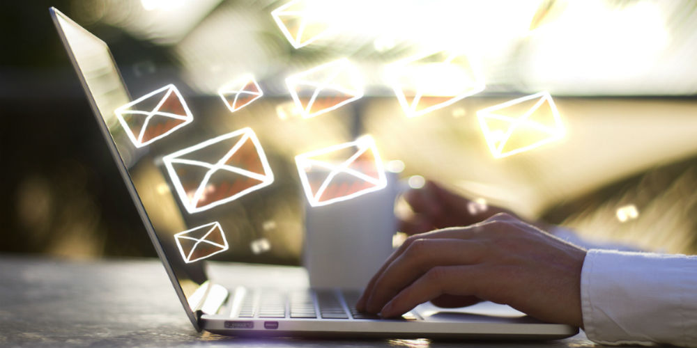 bigstock-Man-With-Laptop-And-Email-Conc-96327824
