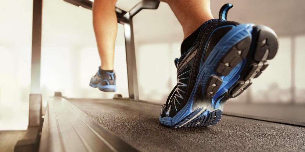 bigstock-Man-running-in-a-gym-on-a-trea-61080305-e1448030132202