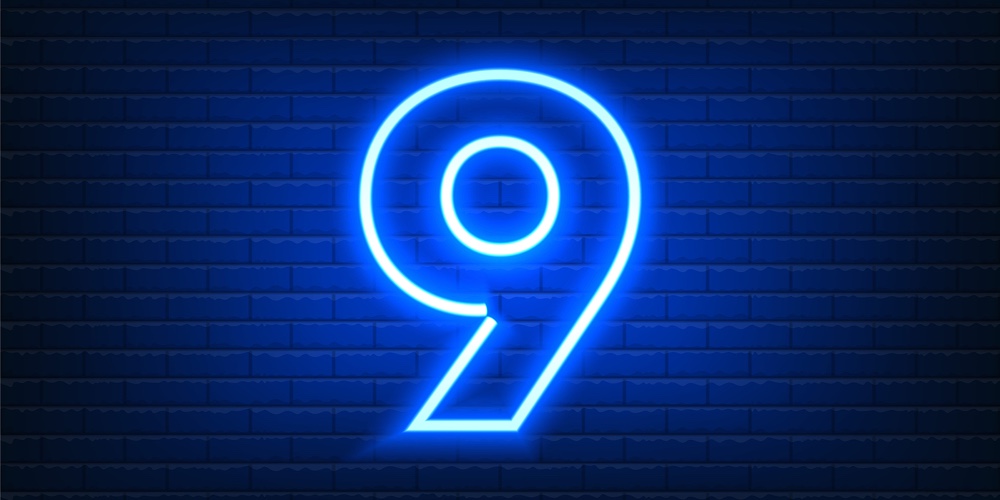 Number Nine Neon Sign On Brick Wall Background. Vintage Blue Electric Signboard With Bright Neon Lig