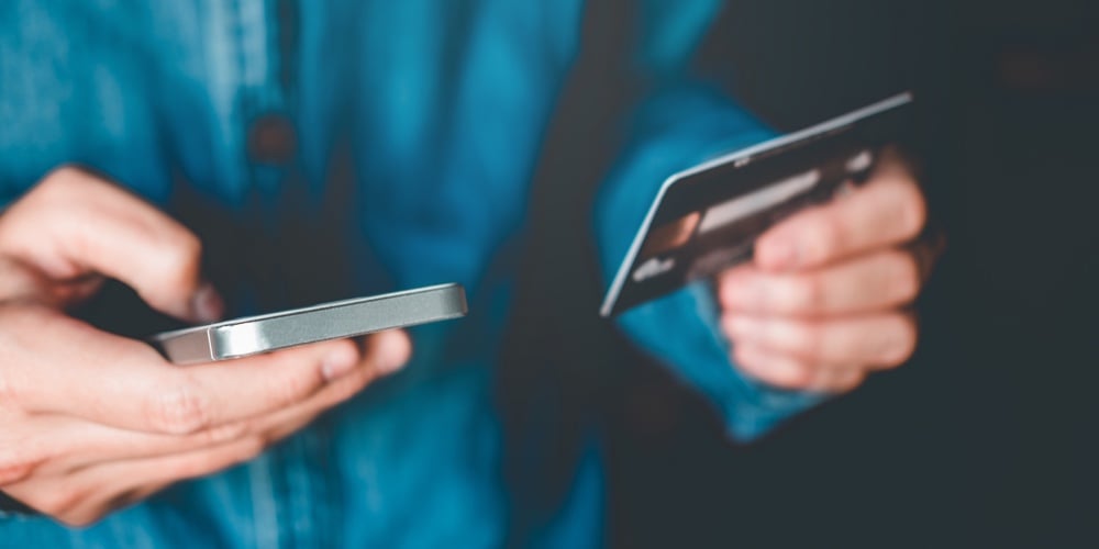 Online Banking Businessman Using Smartphone With Credit Card Fintech And Blockchain Concept