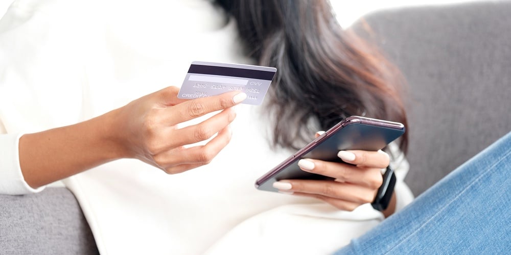 bigstock-Online-Phone-Payment-By-Credit-384807410