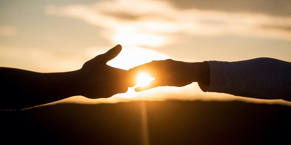 bigstock-Outstretched-Hands-Salvation-397193342
