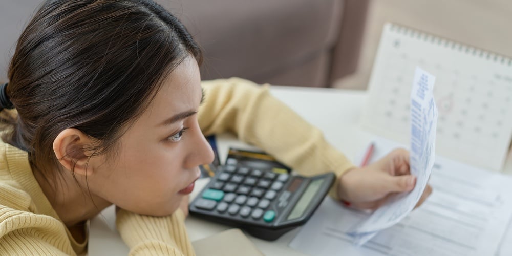 bigstock-Owe-Problem-Asian-Woman-Fema-437271539