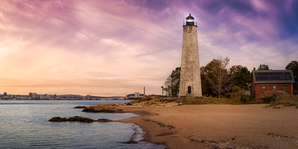 Panoramic View On A Lighthouse On The Atlantic Ocean Coast. Colorful Sunrise Sky Art Render. Taken I