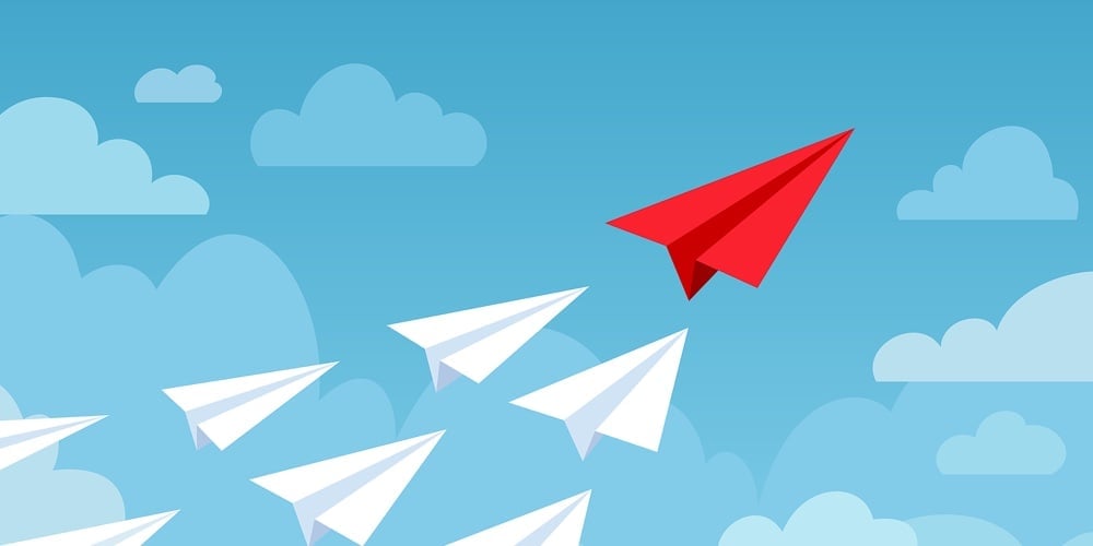bigstock-Paper-Plane-Flying-Planes-Whi-380660407