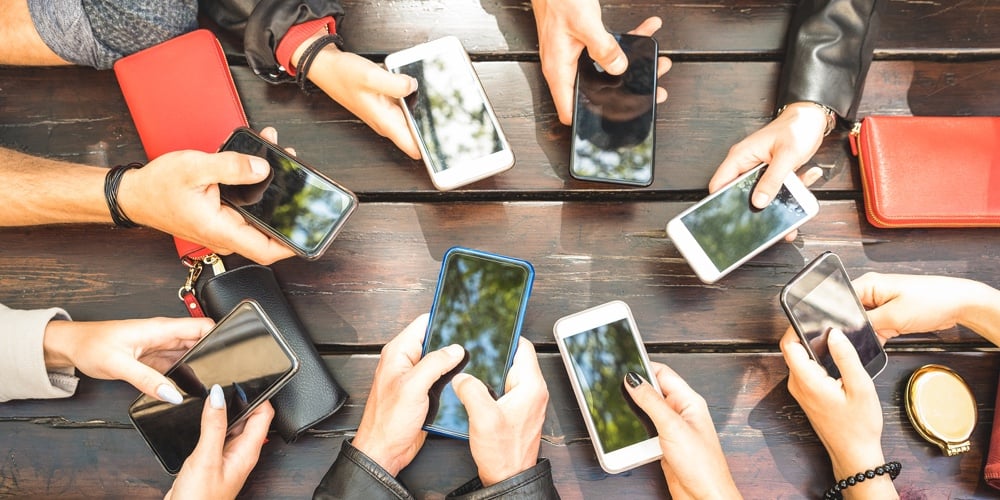 bigstock-People-Group-Having-Addicted-F-237032038