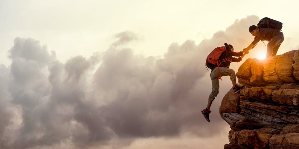 bigstock-People-Helping-Each-Other-Hike-291025345