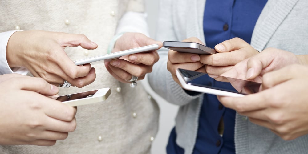 bigstock-People-Using-Cellphone-82350056