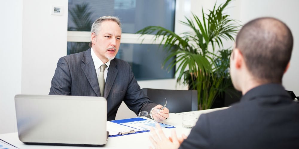 bigstock-People-talking-about-business-69127819