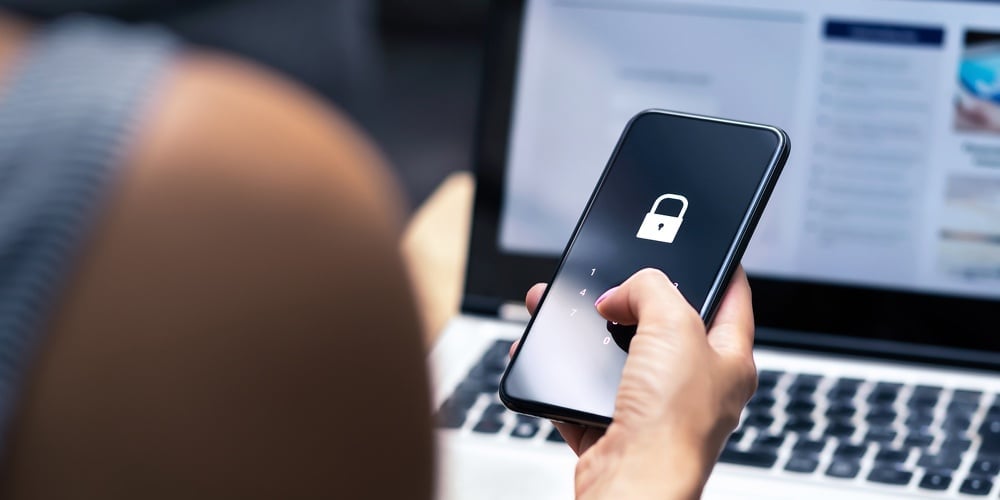 bigstock-Phishing-Mobile-Phone-Hacker-409068980