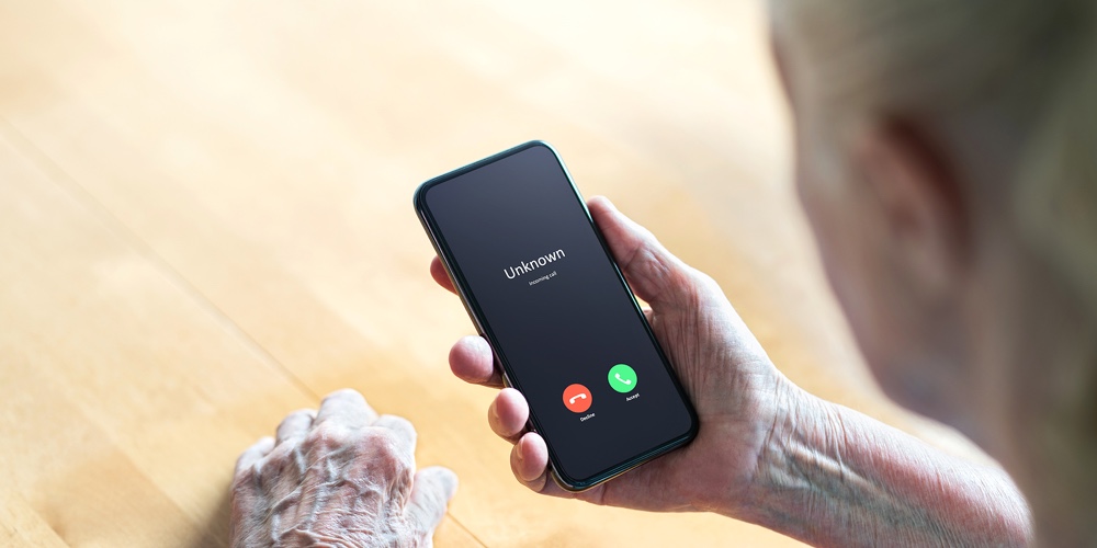 Phone Call To Old Woman From Scam Or Fraud Caller. Elder Senior Answering To Unknown Number. Smartph