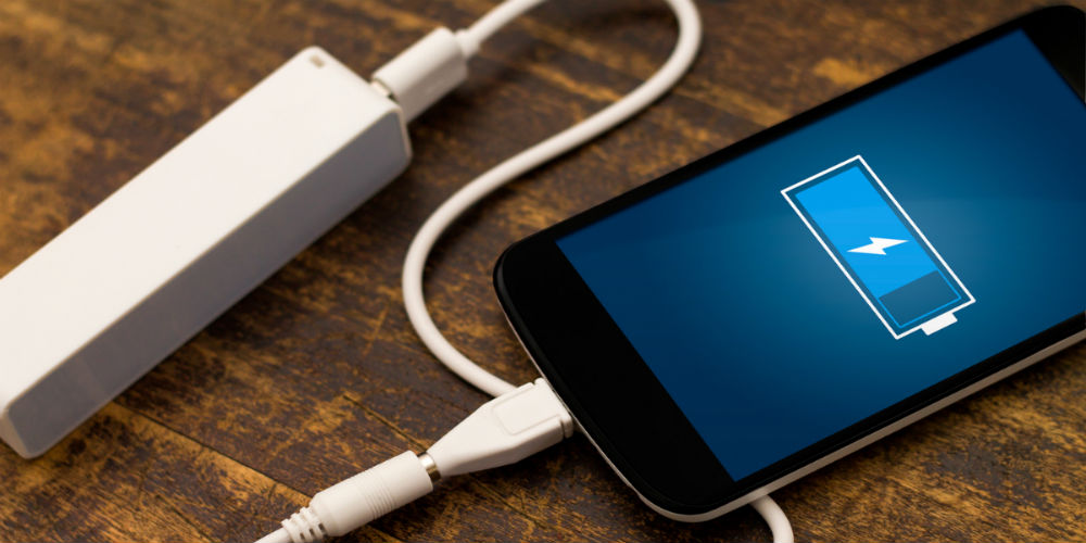 bigstock-Phone-charging-with-energy-ban-63939898
