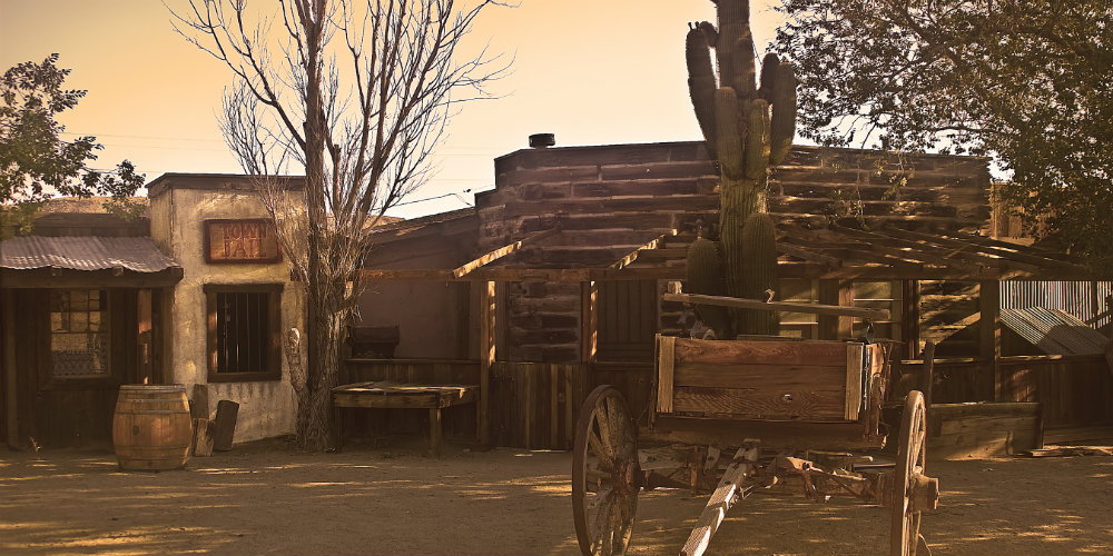 bigstock-Pioneer-Town-In-Sepia-3997823|bigstock-Horses-Stampeding-Toward-The-C-2301637