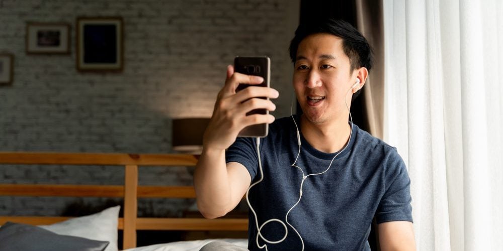 Portrait Of Happy 30s Aged Asian Man In Casual Clothing Making F