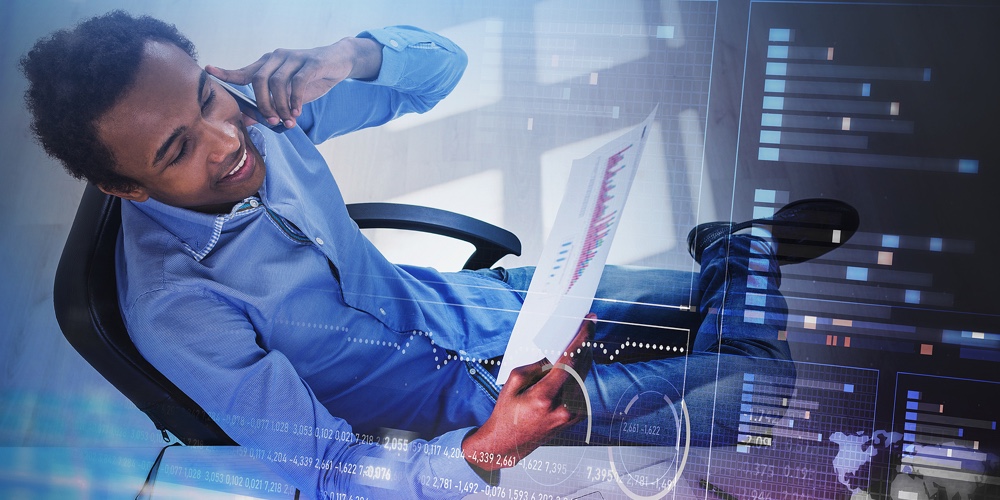 Portrait Of Young African American Businessman Working In Blurry Office With Double Exposure Of Imme