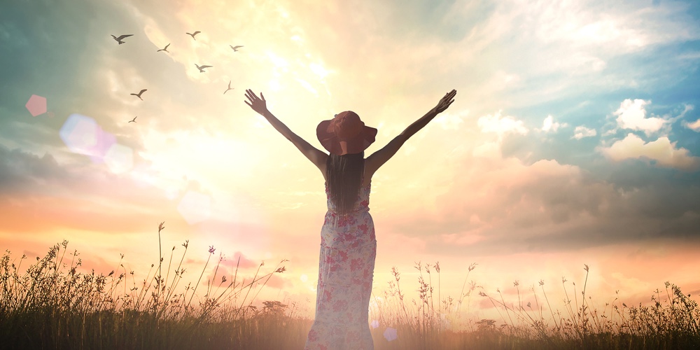 Praise And Worship God Concept: Silhouette Of Healthy Woman Raised Hands For Praise And Worship God