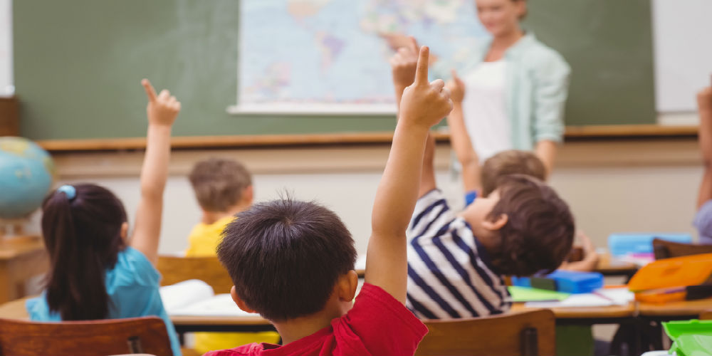 bigstock-Young-child-holding-stack-of-b-59047433|bigstock-Pupils-raising-hand-during-geo-83001707