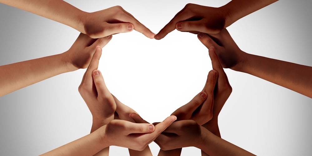 bigstock–225032344|Racial Love With White Caucasion And Black African American Hands Shaped As An Interracial Heart Rep
