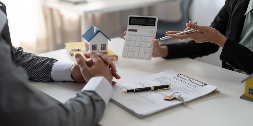 Real Estate Agent Showing Financial Rate Home Loan For Sign Agreement Customer The Contract Legally