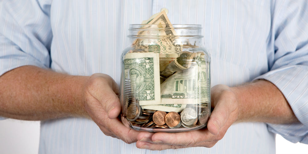 bigstock-Retirees-Retirement-Piggy-Bank-92225267