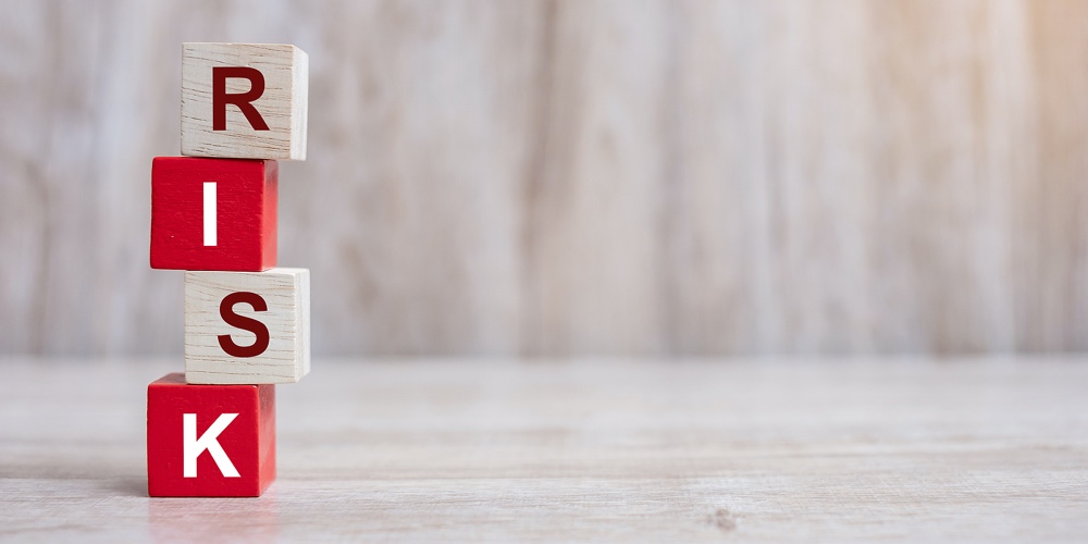 image1|image2|Risk Text Blocks Arrange On Table Background. Business