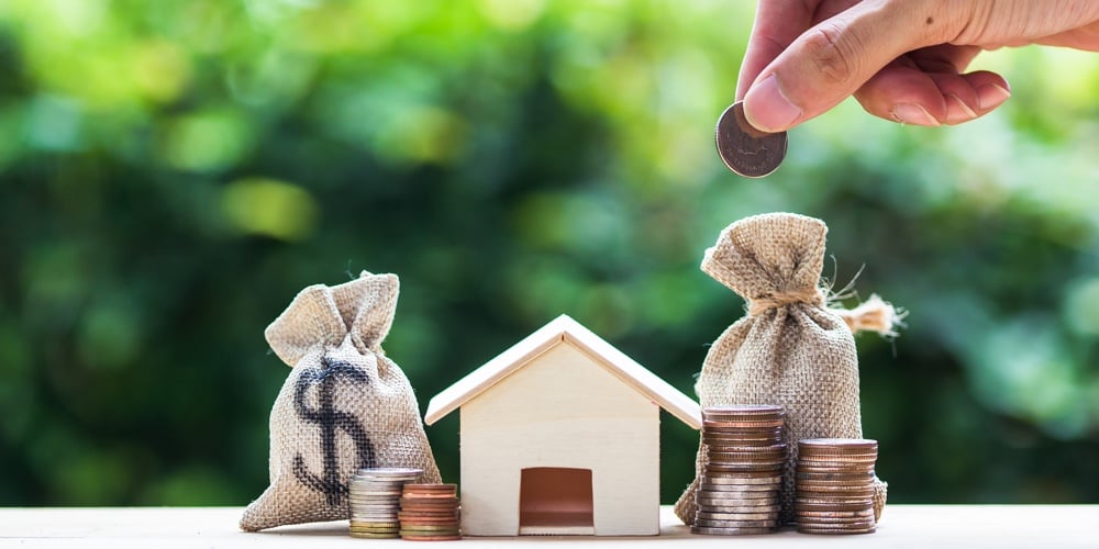 bigstock-Saving-Money-Home-Loan-Mortg-264395683