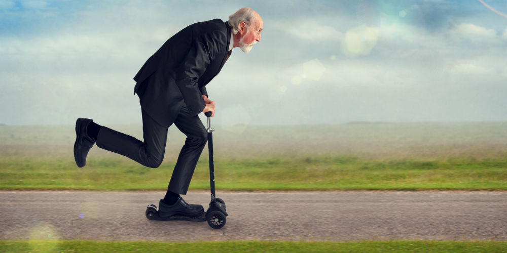 bigstock-Senior-Man-Riding-A-Scooter-67793356|RetirementFair_Mark|retirement_fair_materials_icon