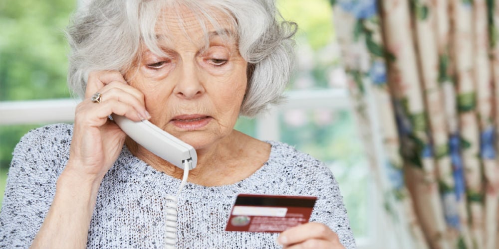 bigstock-Senior-Woman-Giving-Credit-Car-95026709