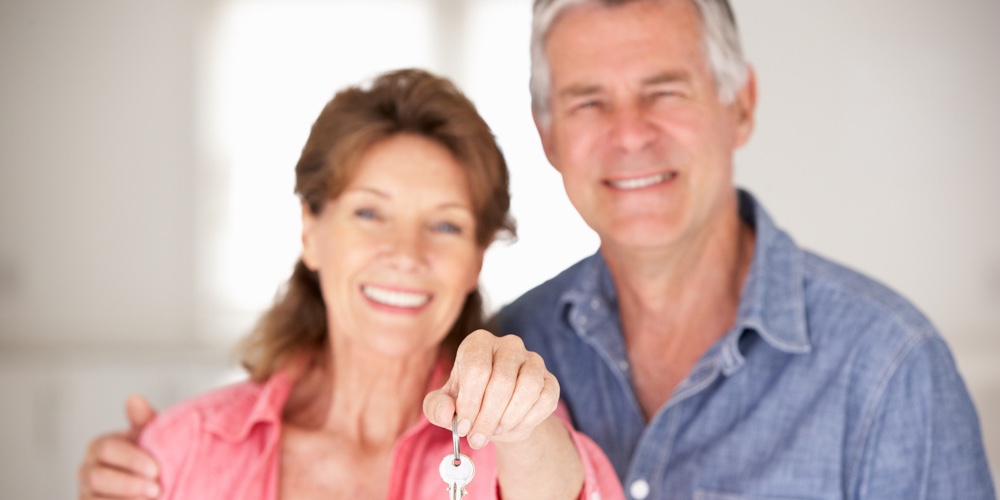 Senior couple moving into new home