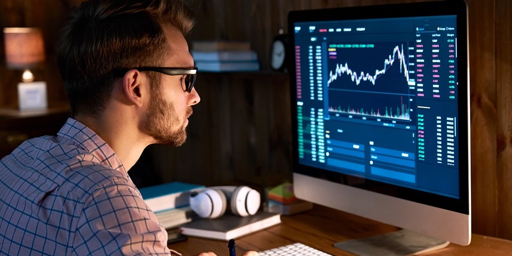 Serious Business Man Trader Analyst Looking At Computer Monitor