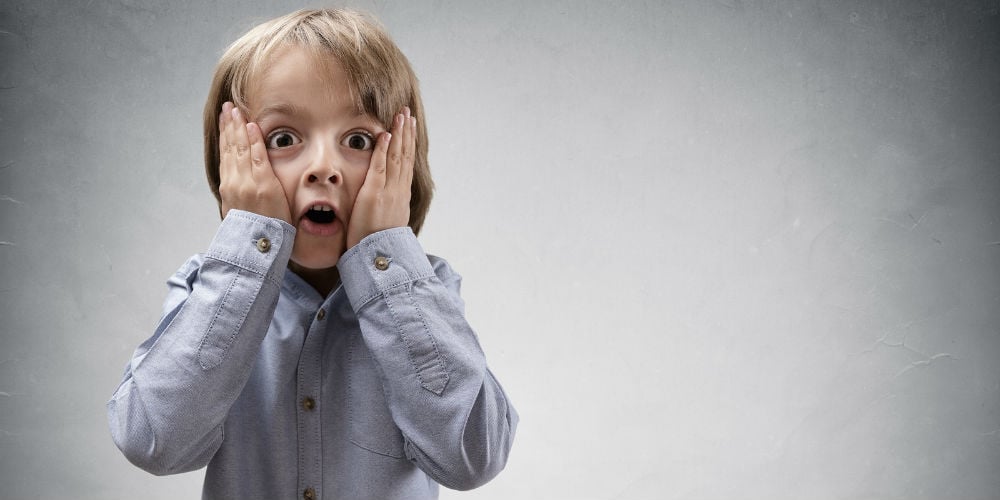 bigstock-Shocked-and-surprised-boy-with-105925043