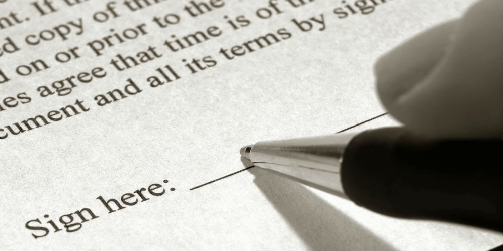 bigstock-Signing-A-Document-4258479