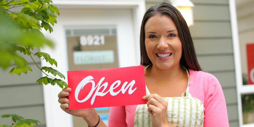bigstock-Small-Business-owner-with-ope-24830186