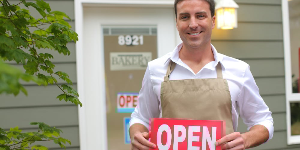 bigstock-Small-Business-owner-with-ope-24830198