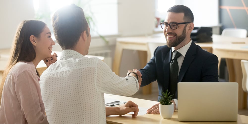 bigstock-Smiling-Lawyer-Realtor-Or-Fin-239150410