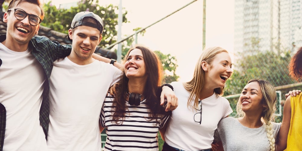 bigstock-Smiling-happy-young-adult-frie-227453212