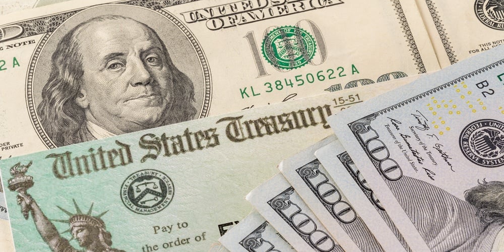 Stack Of 100 Dollar Bills With Illustrative Coronavirus Stimulus Payment Check To Show The Virus Sti|670×447-Featured Photo Size
