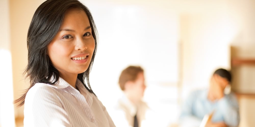 bigstock-Standing-Asian-Businesswoman-A-24133670